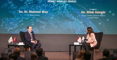 Trade Minister Mehmet Muş (L) speaks during a panel held within the scope of the Türkiye Export Mobilization Summit, organized by Daily Sabah’s parent company Turkuvaz Media’s flagship Sabah newspaper, in Istanbul, Türkiye, Dec. 29, 2022. (AA Photo)