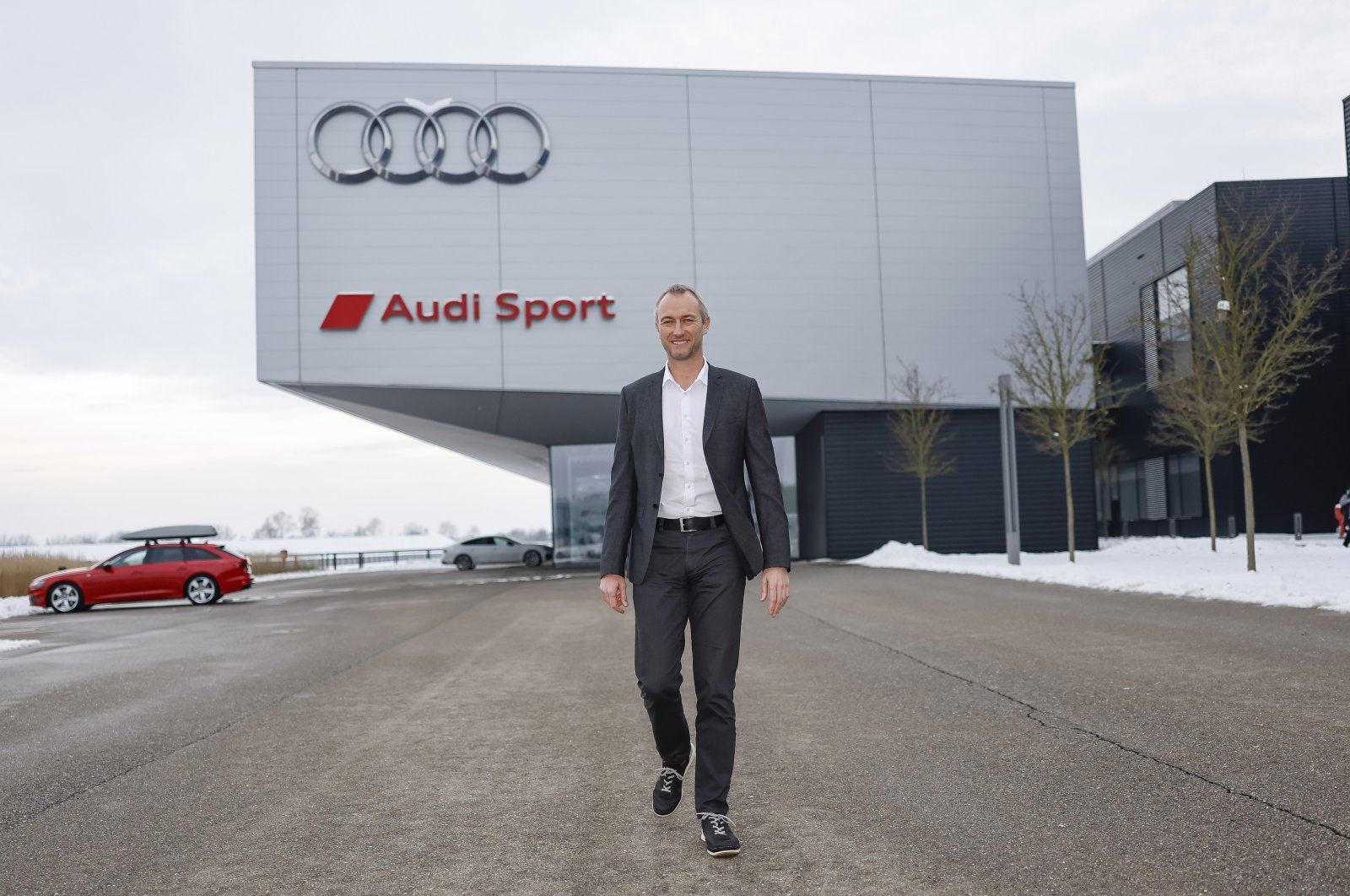 Formula 1 Project Manager at Audi and Managing Director of Audi Formula Racing GmbH Adam Baker stands in front of the Audi Sport building, Bavaria, Germany, Dec. 19, 2022. (Getty Images Photo)