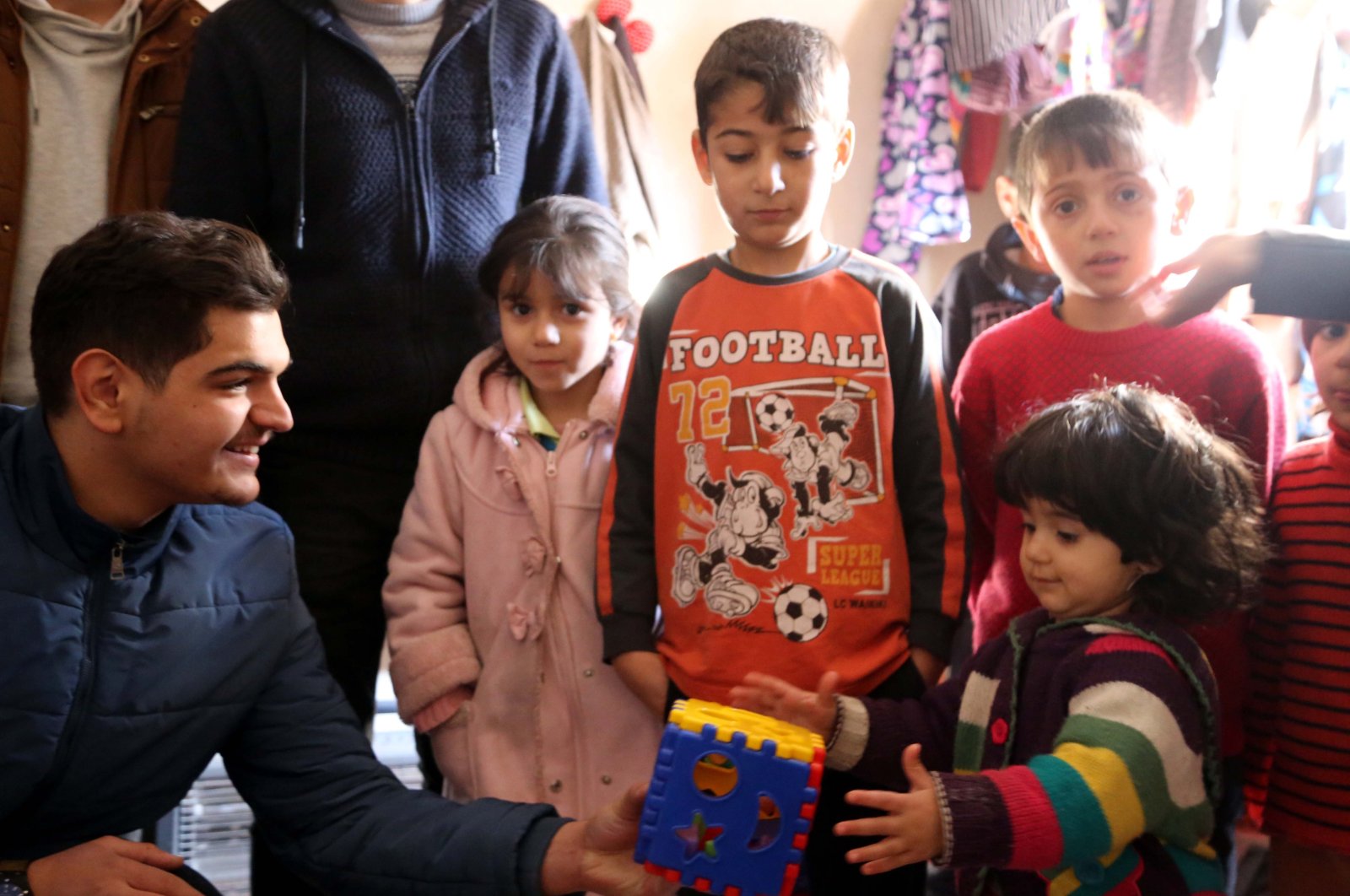 Volunteers deliver toys to Iraqi refugee children, in Eskişehir, central Türkiye, Jan. 21, 2019. (AA Photo) 