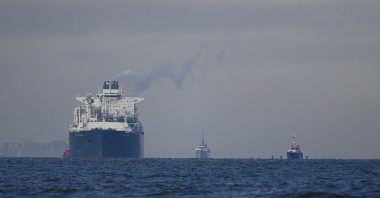 Floating Storage Regasification Unit (FSRU) ship "Hoegh Esperanza" is guided by tug boats during its arrival at the port of Wilhelmshaven, Germany,  Dec, 15, 2022. (AP Photo)