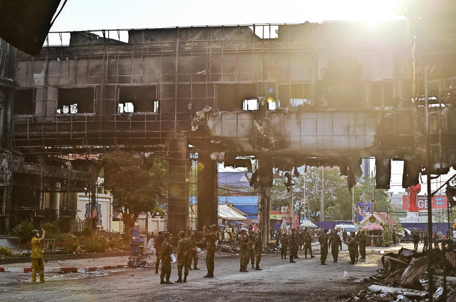 Cambodian soldiers patrol the destroyed part of the Grand Diamond City hotel-casino after a fire, Poipet, Cambodia, Dec. 30, 2022. (AFP Photo)