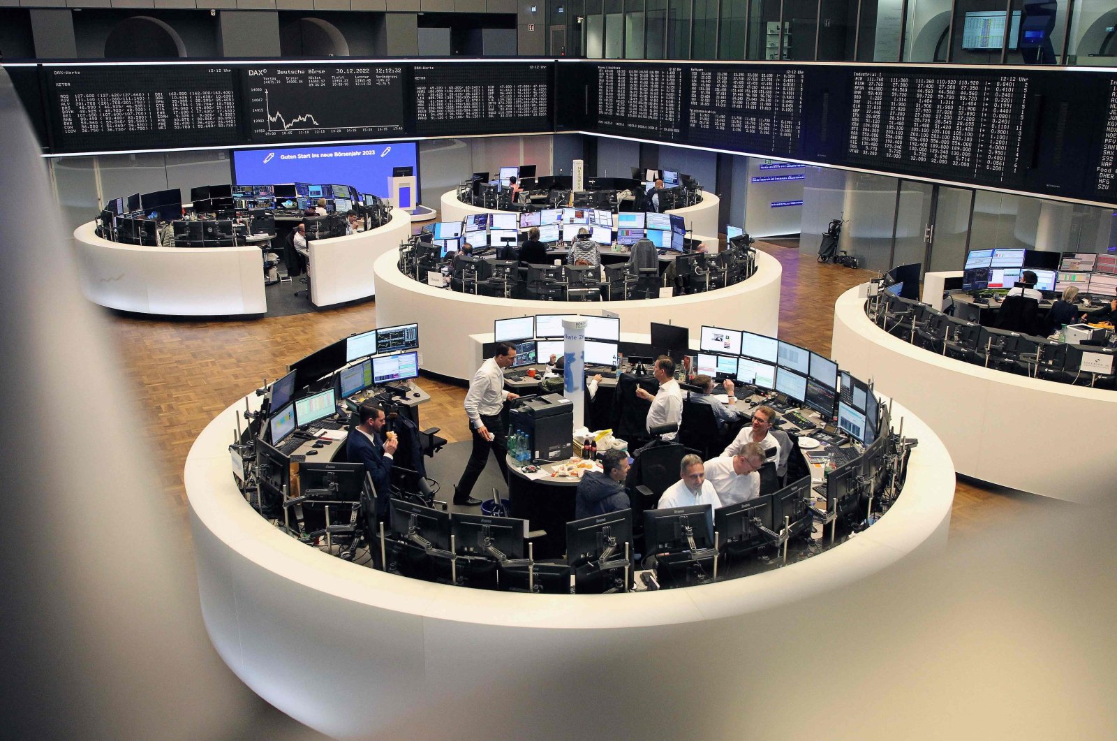 Brokers work at the stock exchange in Frankfurt am Main, Germany, Dec. 30, 2022. (AFP Photo)