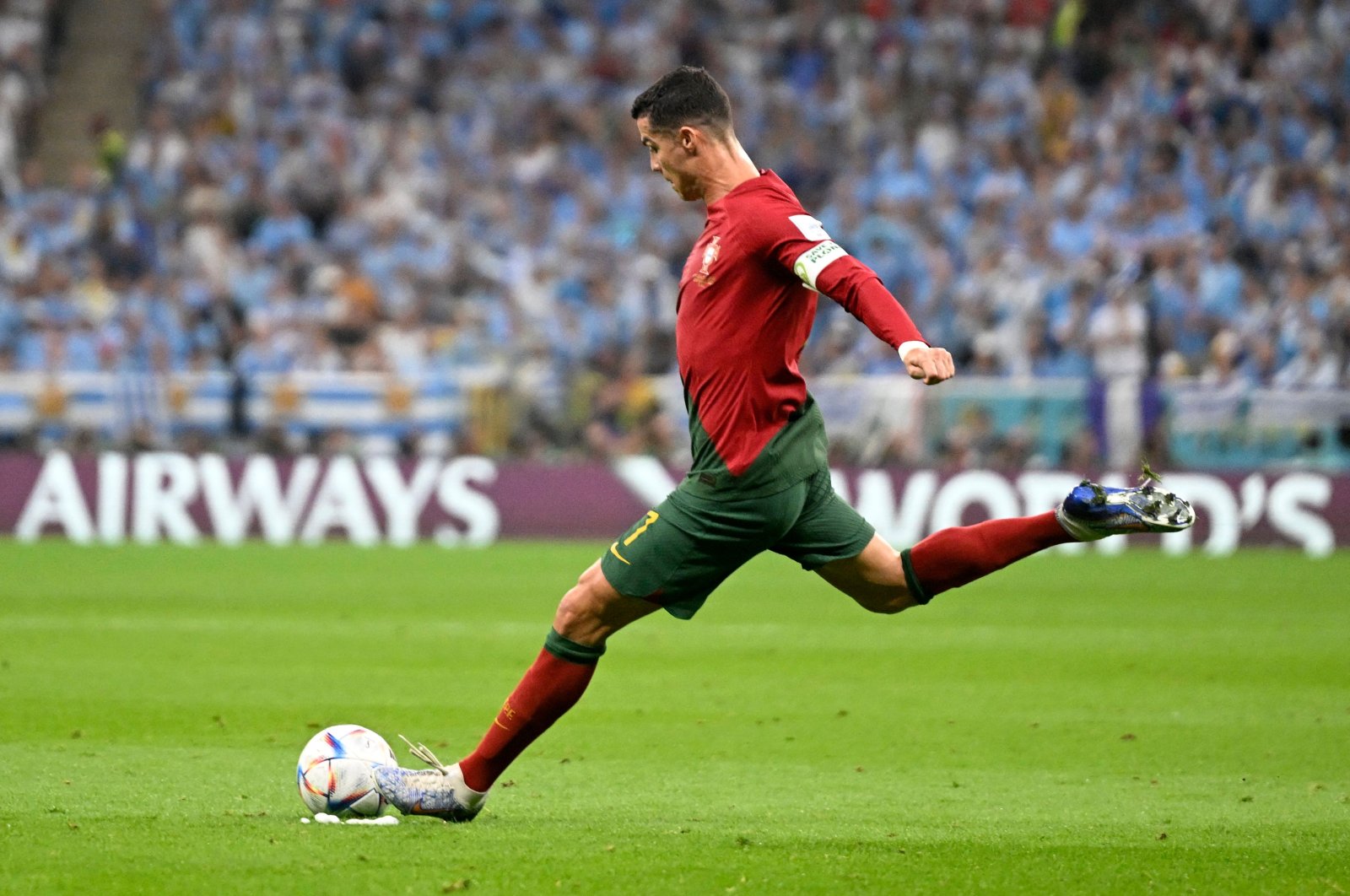 In this file photo taken on Nov. 28, 2022, Portugal&#039;s forward #07 Cristiano Ronaldo takes a free kick during the Qatar 2022 World Cup Group H football match between Portugal and Uruguay at the Lusail Stadium in Lusail, north of Doha. (AFP File Photo)