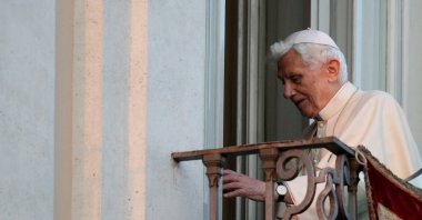Pope Benedict XVI leaves as he appears for the last time at the balcony of his summer residence after his resignation in Castelgandolfo, south of Rome, Italy Feb. 28, 2013.  (Reuters File Photo)