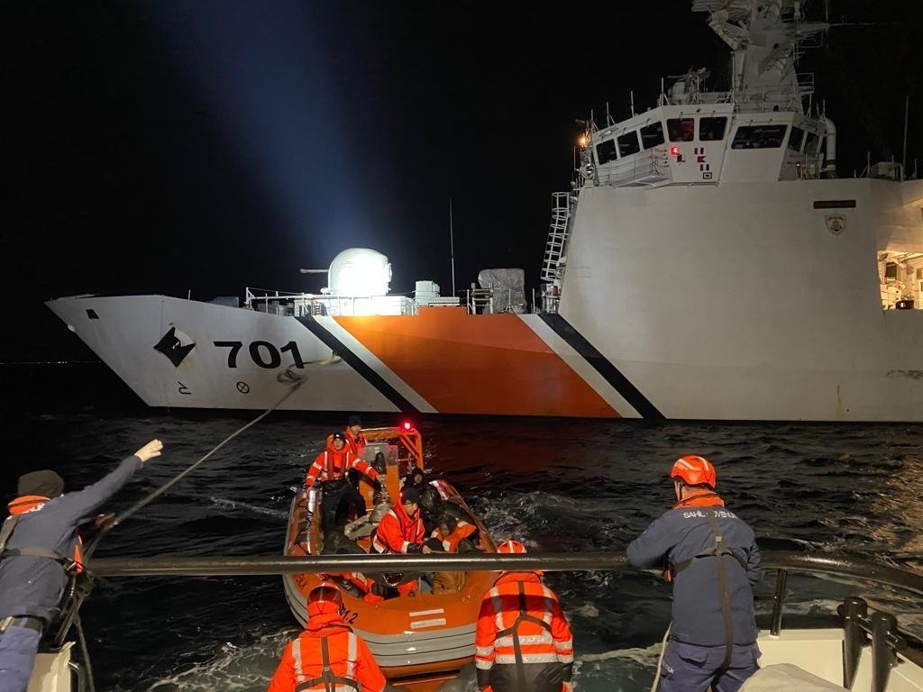 A Turkish Coast Guard Command team rescues irregular migrants pushed back by Greece as they tried to cross into Europe from Türkiye&#039;s western Balıkesir province, Dec. 12, 2022. (AA File Photo)