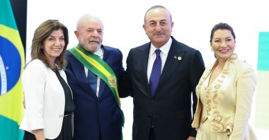 Foreign Minister Mevlüt Çavuşoğlu is seen with Brazilian President Luiz Inácio Lula da Silva at the swearing-in ceremony in the capital Brasilia, Brazil, Jan. 2, 2022 (AA Photo)