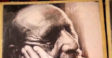 One of the photographs displayed at the photo gallery dedicated to folk poet Aşık Veysel, in Sivas, Türkiye, Dec. 29, 2022. (IHA Photo)