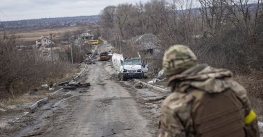 A Ukrainian serviceman looks at an empty street, as Russia's attack on Ukraine continues, in the village of Torske, Donetsk, Ukraine, Dec. 30, 2022. (Reuters Photo)