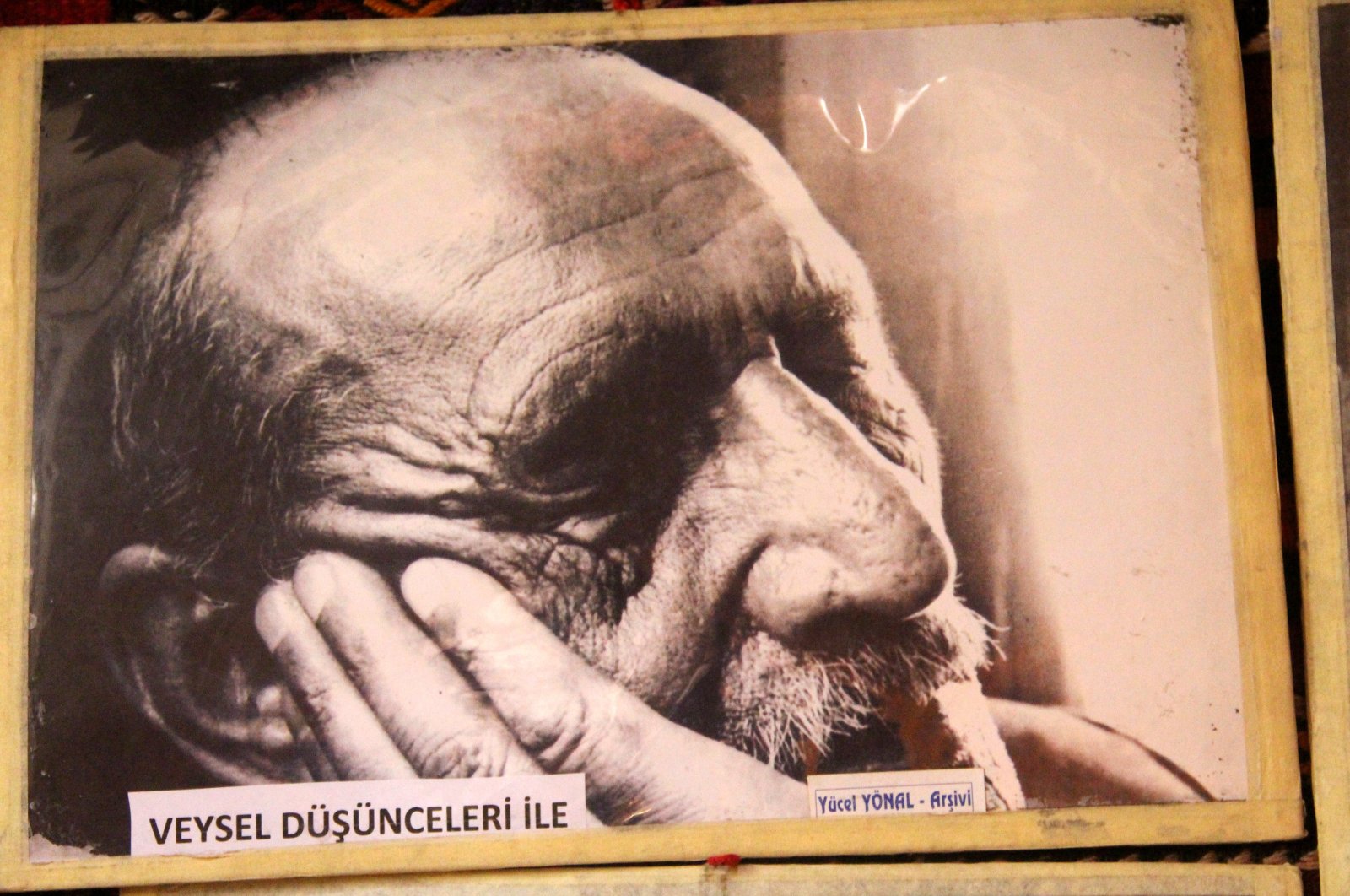 One of the photographs displayed at the photo gallery dedicated to folk poet Aşık Veysel, in Sivas, Türkiye, Dec. 29, 2022. (IHA Photo)
