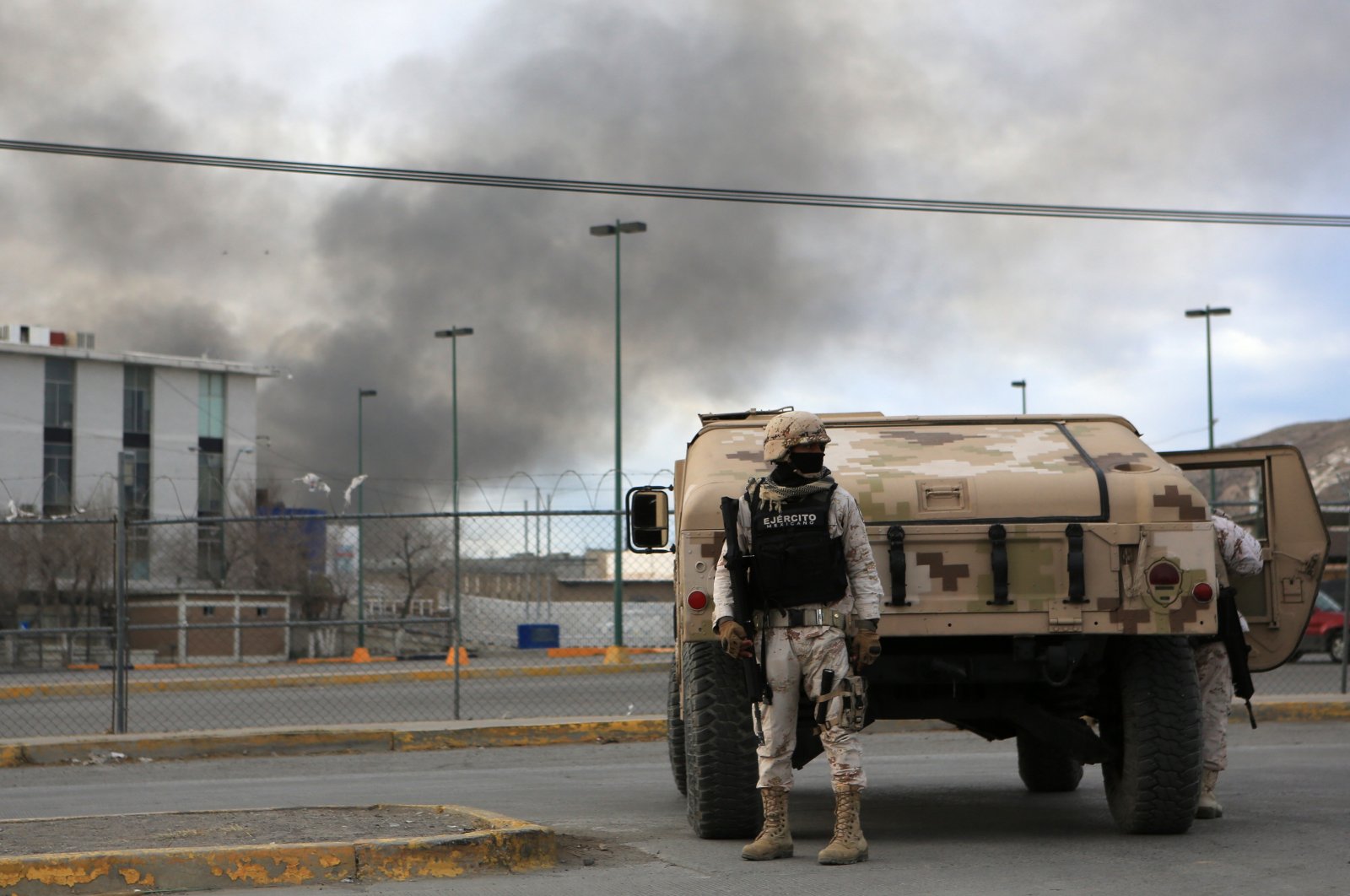 Members of the Mexican Army guard the area outside a prison where an armed attack took place, in Ciudad Juarez, Mexico, Jan. 1, 2023. (EPA Photo)