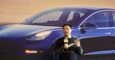 Tesla&#039;s China chief Tom Zhu speaks at a delivery ceremony for China-made Tesla Model 3 vehicles in the Shanghai Gigafactory of the U.S. electric car maker in Shanghai, China, Dec. 30, 2019. (Reuters Photo)