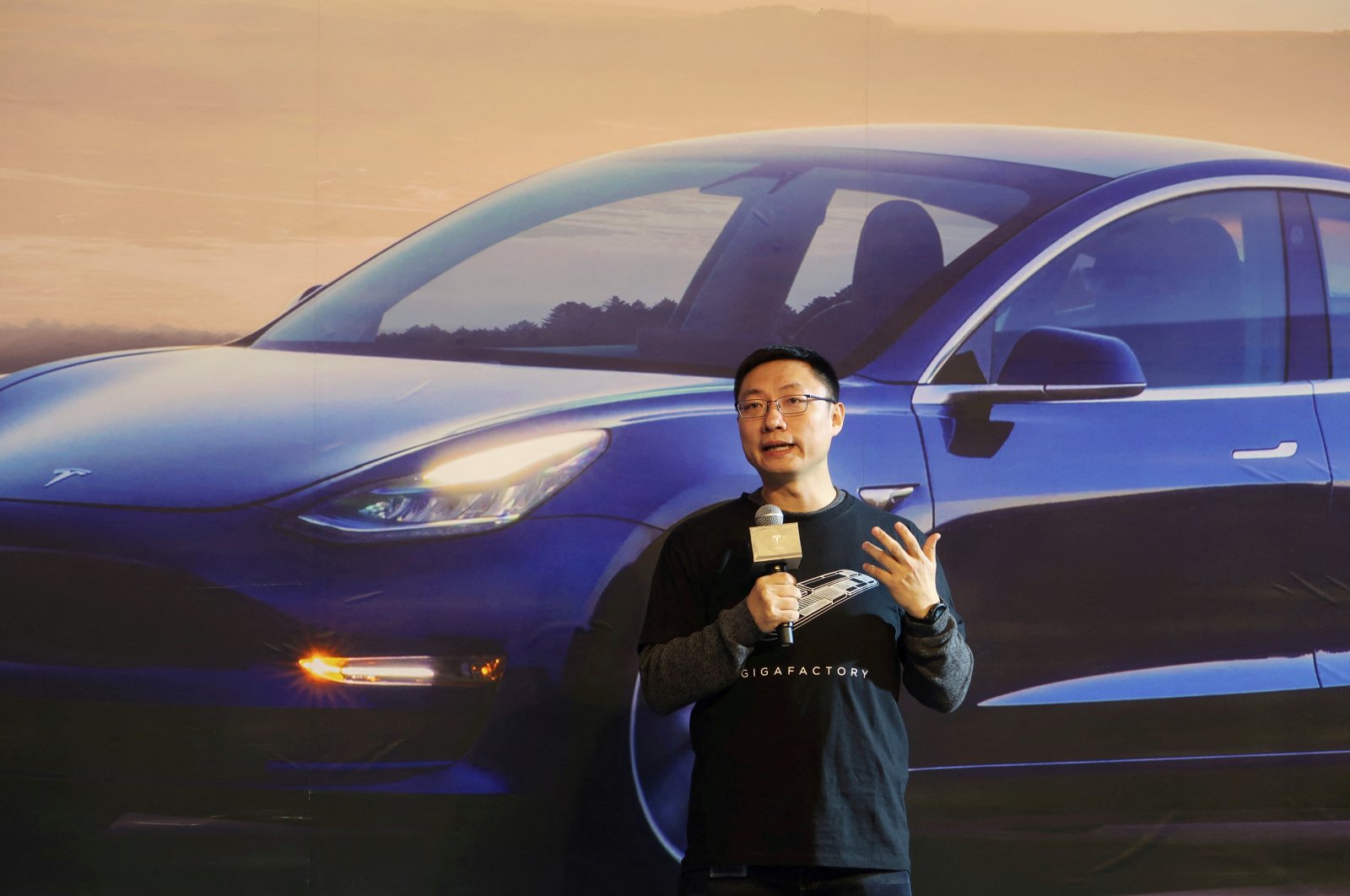 Tesla&#039;s China chief Tom Zhu speaks at a delivery ceremony for China-made Tesla Model 3 vehicles in the Shanghai Gigafactory of the U.S. electric car maker in Shanghai, China, Dec. 30, 2019. (Reuters Photo)