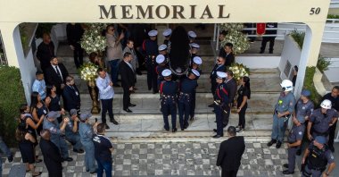 The coffin of the late Brazilian football star Pele is transported to the Santos' Memorial Cemetery after the funeral procession, Santos, Sao Paulo state, Brazil, Jan. 3, 2023. (AFP Photo)