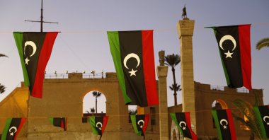 Libyan flags are displayed as people celebrate the February Revolution Day in Martyrs&#039; Square in Tripoli, Libya, Friday, Feb. 18, 2022. (AP File Photo)