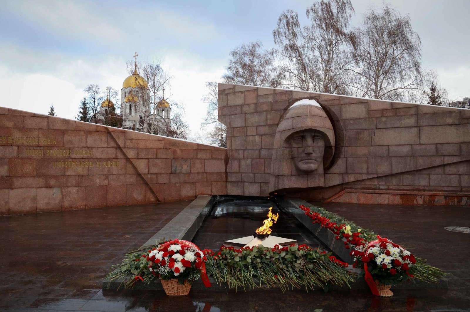 Flowers laid at the memorial Eternal flame for more than 80 Russian soldiers killed in a Ukrainian strike on Russian-controlled territory, Samara, Russia, Jan. 3, 2023. (AFP Photo)
