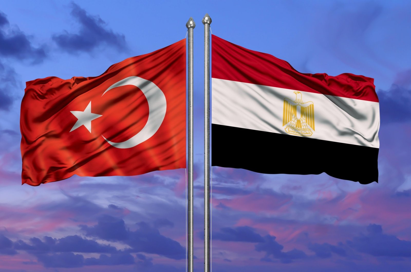 A file photo of Turkish and Egyptian flags fluttering side by side. (Shutterstock Photo)