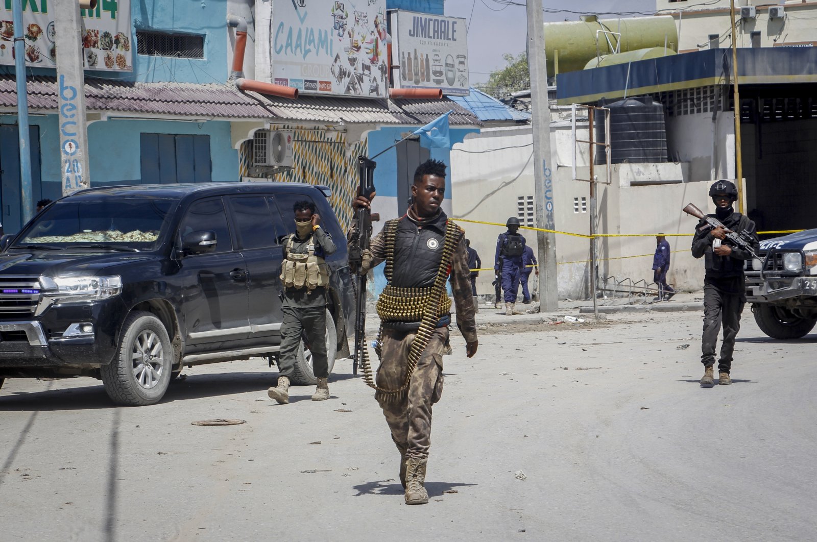 Somali security forces patrol the scene of a previous terrorist attack in Mogadishu, Somalia, Aug. 21, 2022. (AP Photo)
