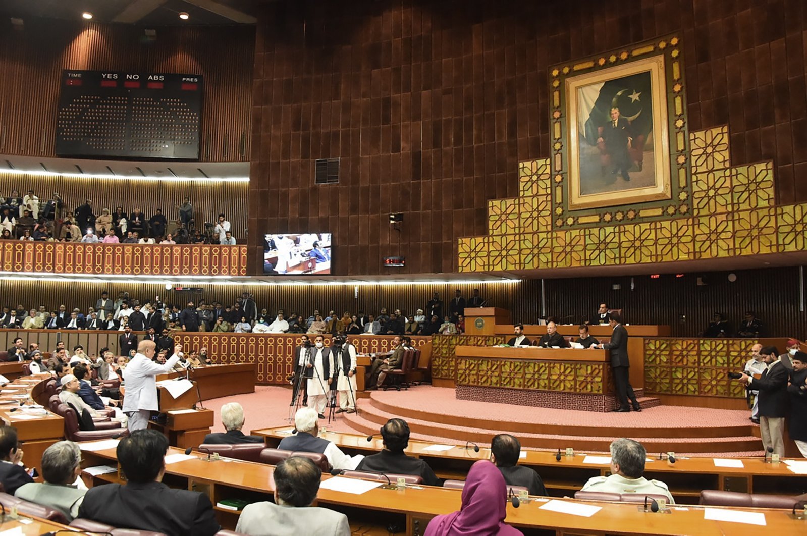 In this photo released by the National Assembly of Pakistan, newly elected Pakistani Prime Minister Shahbaz Sharif, lower left, addresses during a session of the National Assembly, in Islamabad, Pakistan, Monday, April 11, 2022. (National Assembly of Pakistan via AP)