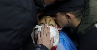 Friends of Palestinian teenager Amer Abu Zeitoun, killed by Israeli forces in an overnight raid in Nablus, bid him farewell, occupied West Bank, Palestine, Jan. 5, 2023. (AFP Photo)