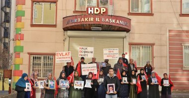 Kurdish families, whose children were abducted by the PKK, protest against the terrorist group and the pro-PKK Peoples&#039; Democratic Party (HDP) in front of the party&#039;s office in southeastern Diyarbakır province, Türkiye, Jan. 3, 2022. (DHA Photo)