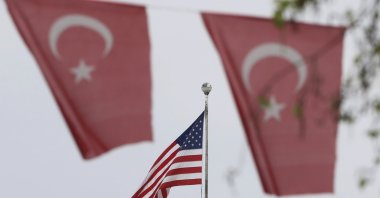 Turkish flags decorate a street outside the United States embassy in Ankara, Türkiye, April 25, 2021. (AP Photo)