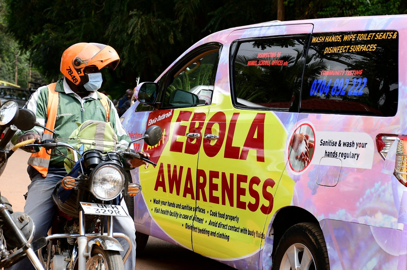An anti-Ebola advocacy van drives along Kyadondo road amid the Ebola outbreak and alert in Kampala, Uganda, Oct. 27, 2022. (Reuters File Photo)