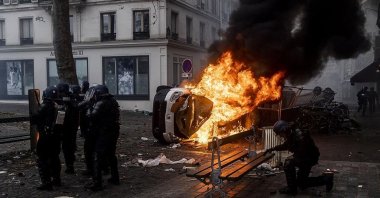 A car burns during riots by PKK supporters in Paris, France, Dec. 24, 2022. (AA Photo)