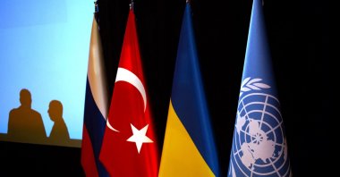 The flags representing (from L): Russia, Türkiye, Ukraine and the United Nations, decorate the stage where the Turkish National Defense Minister and the U.N. Secretary-General will hold a joint press conference at the Joint Coordination Center established in Istanbul for the safe shipment of grain products from the Black Sea region, Aug. 20, 2022. (AFP Photo)