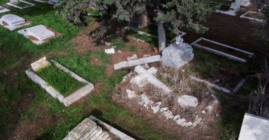 An aerial view shows vandalized tombstones at the Protestant Mount Zion Cemetery where acts of vandalism took place in East Jerusalem, occupied Palestine, Jan. 4, 2023. (Reuters File Photo)
