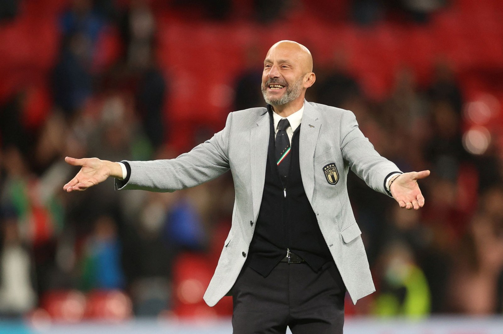 Italy delegation chief Gianluca Vialli celebrates with staff after winning the penalty shootout after a Euro 2020 semifinals match between Italy and Spain at Wembley Stadium, London, Britain, July 6, 2021. (Reuters Photo)