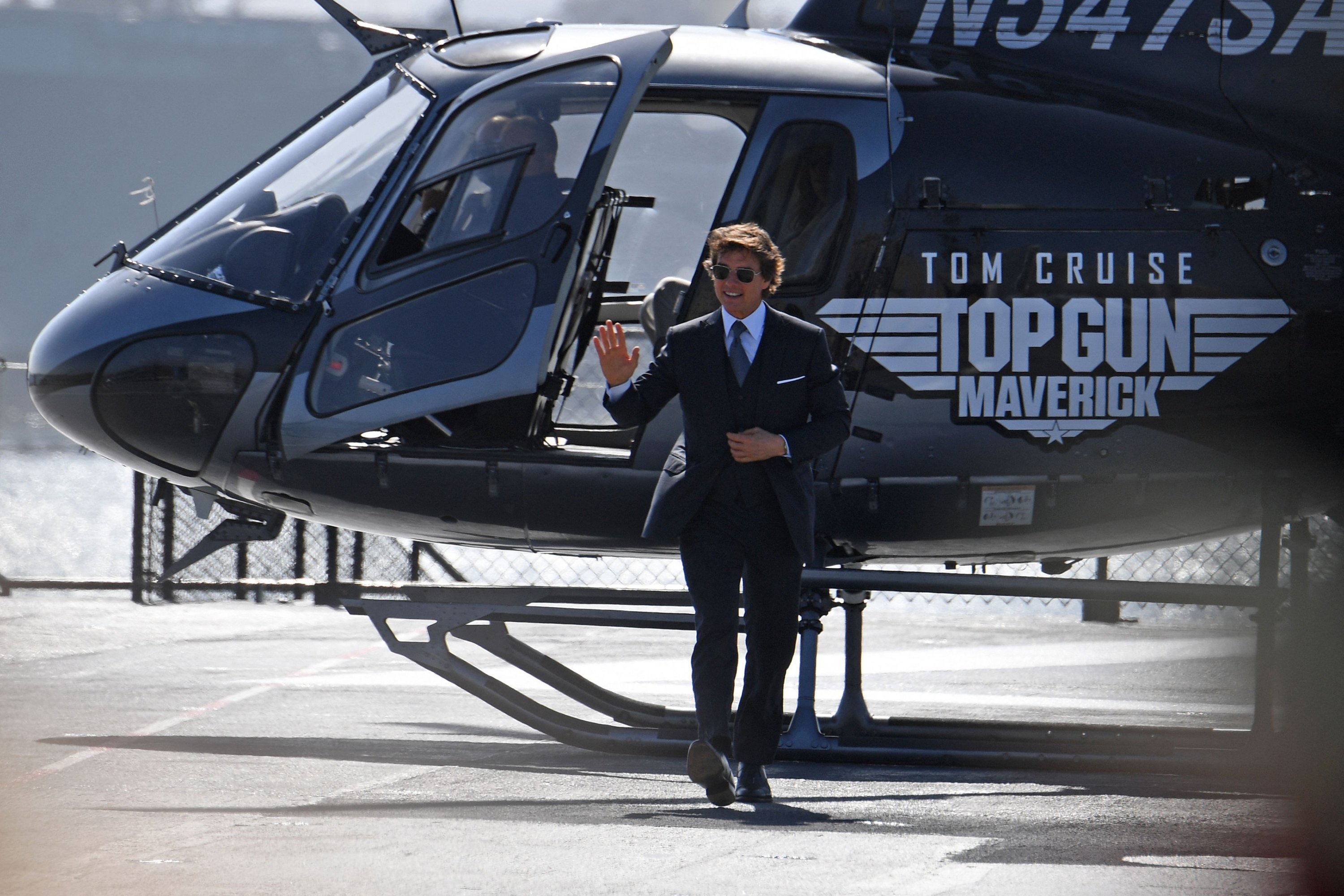 U.S. actor Tom Cruise arrives in a helicopter for the world premiere of 