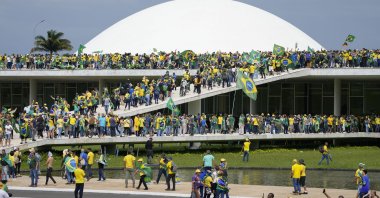 Protesters, supporters of Brazil's former President Jair Bolsonaro, storm the National Congress building in Brasilia, Brazil, Jan. 8, 2023. (AP Photo)