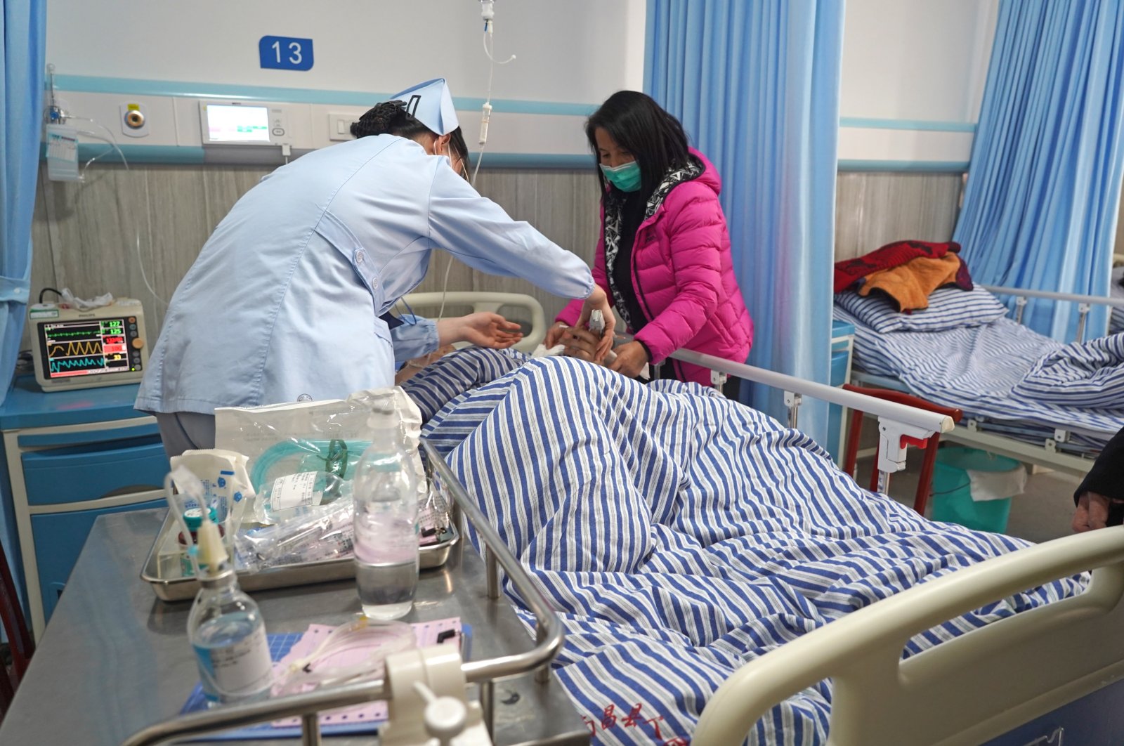 A wounded person receives treatment at a hospital in Nanchang County, Jiangxi Province, east China, Jan. 8, 2023. (EPA Photo)