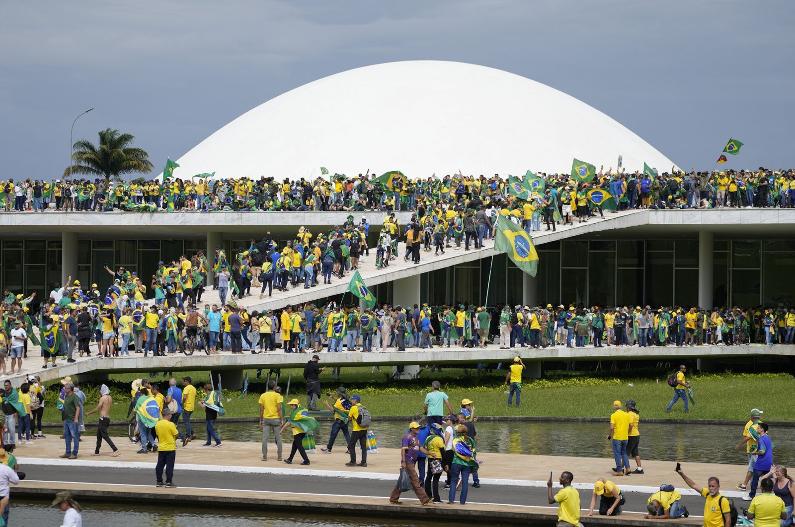 Protesters, supporters of Brazil&#039;s former President Jair Bolsonaro, storm the National Congress building in Brasilia, Brazil, Jan. 8, 2023. (AP Photo)