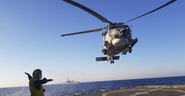 A helicopter takes part in a Greek-U.S. military exercise south of the island of Crete, Greece, Aug. 24, 2020. (AP Photo)