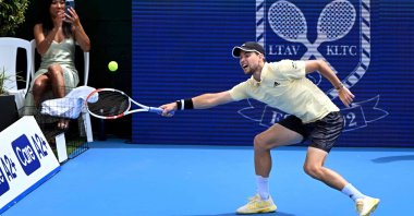 Austria's Dominic Thiem hits a return against Australia's Alex de Minaur during their men's singles match at the Kooyong Classic tennis tournament, Melbourne, Australia, Jan. 10, 2023. (AFP Photo)
