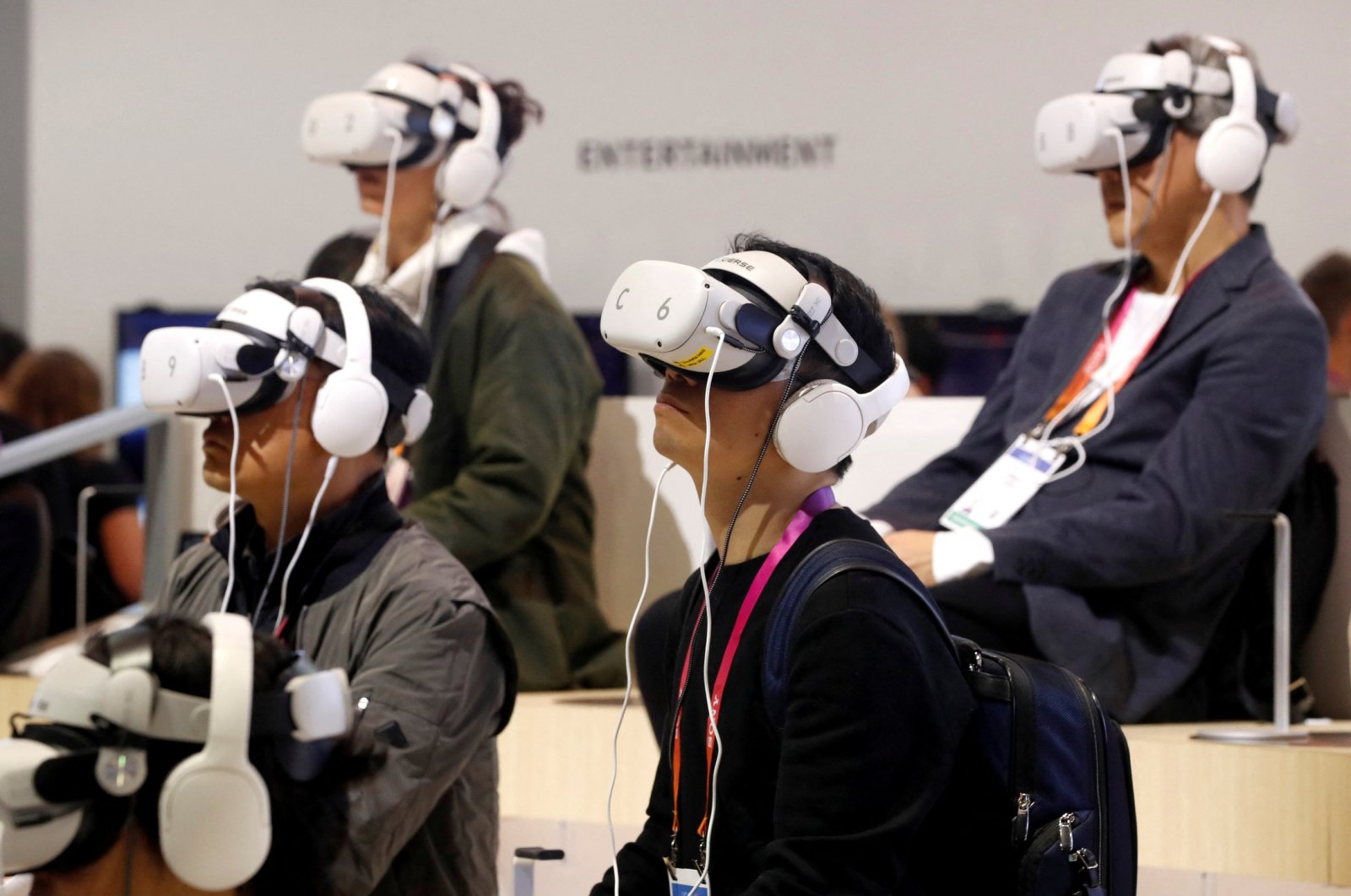 CES attendees attend a virtual reality concert at the Lotte Data Communications booth, during CES 2023 at the Las Vegas Convention Center, in Las Vegas, U.S., Jan. 6, 2023. (Reuters Photo)