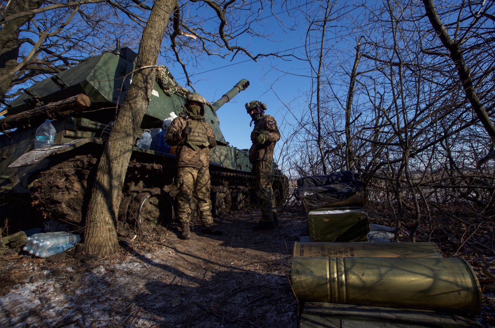 Ukrainian soldiers stand next to a 2S3 Akatsiya self-propelled howitzer at their position on the front line amid Russia&#039;s attack in the Donetsk region, Ukraine, Jan. 8, 2023. (Reuters Photo)