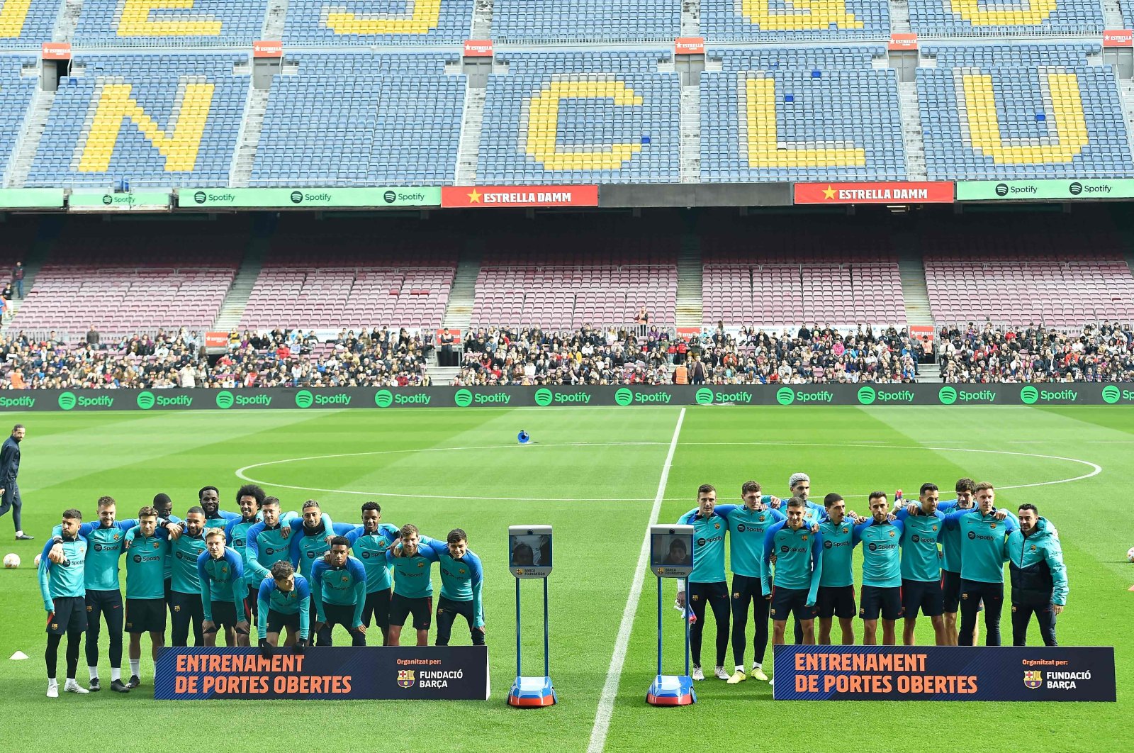 FC Barcelona players pose for pictures during a training session open to fans at the Camp Nou stadium in Barcelona, Spain, Jan. 2, 2023. (AFP Photo)