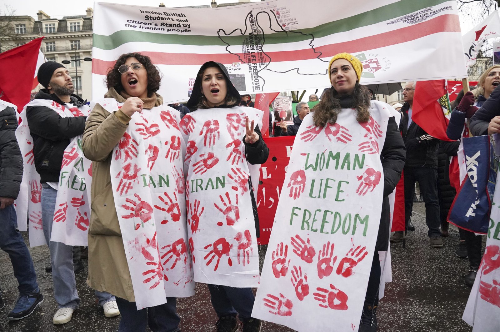 Protesters demonstrate the Iranian government following the death of Mahsa Amini, London, U.K., Jan. 8, 2023. (AP Photo)