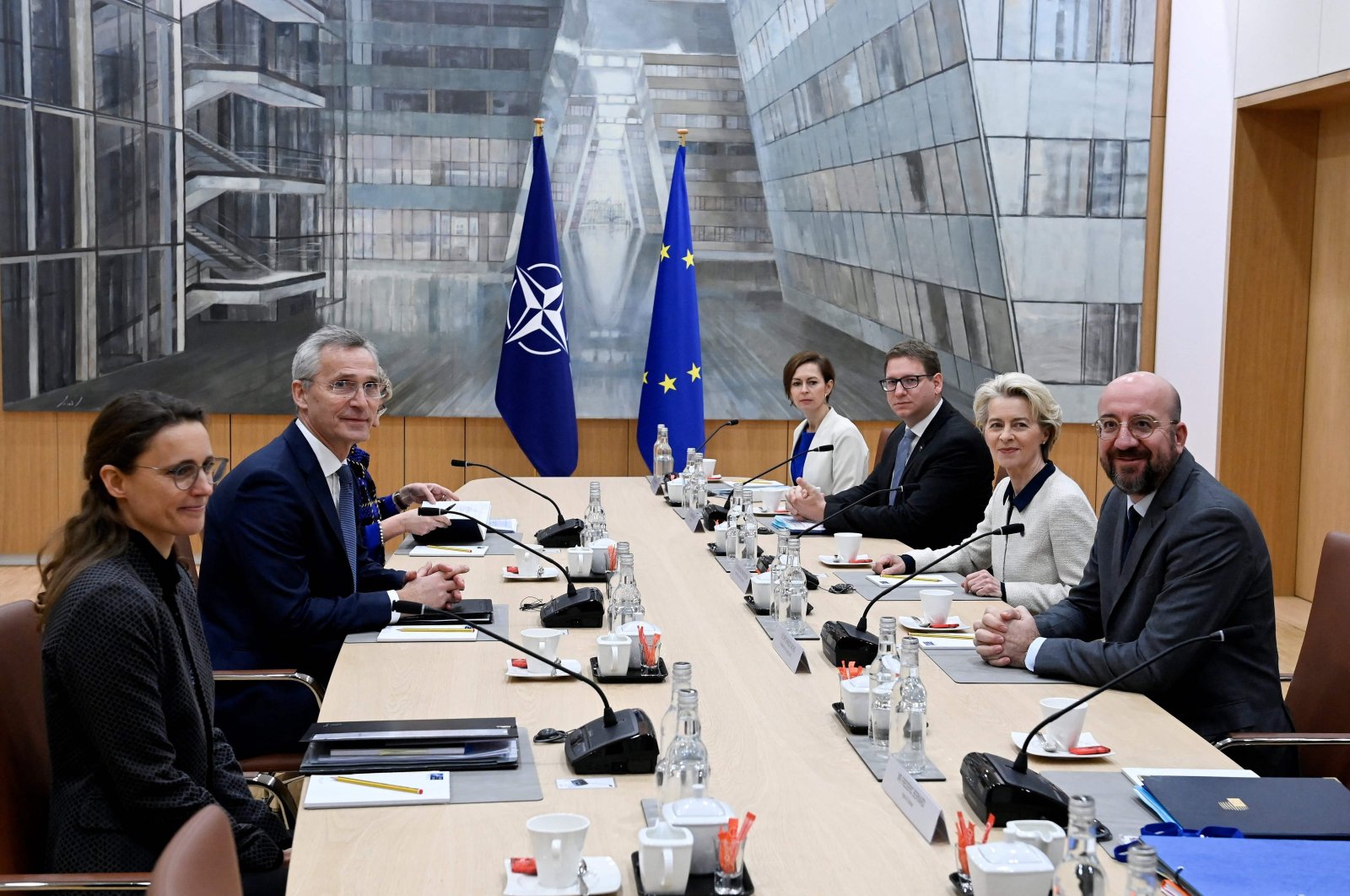 NATO&#039;s Secretary-General Jens Stoltenberg (2ndL), the president of the European Council Charles Michel (R) and President of the European Commission Ursula von der Leyen pose ahead of a meeting in Brussels on Jan. 10, 2023. (AFP Photo)