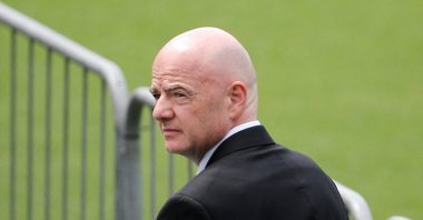 FIFA president Gianni Infantino, queues to pay his respects to Brazilian legend Pele, as the body lies in state in the center circle of his former club Santos' Vila Belmiro stadium, Jan. 2, 2023. (Reuters Photo) 