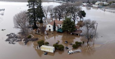 This aerial view shows a flooded home partially underwater in Gilroy, California, U.S., Jan. 9, 2023. (AFP Photo)