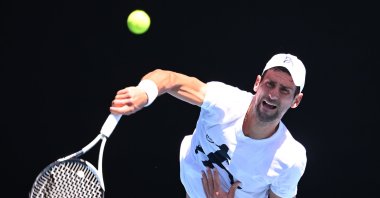 Serbia's Novak Djokovic in action against Daniil Medvedev of Russia during an Australian Open practice match at Melbourne Park, Melbourne, Australia, Jan. 11 2023. (EPA Photo)
