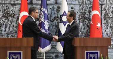Turkish Ambassador to Israel Şakir Özkan Torunlar (L) presents his credentials to Israeli President Isaac Herzog, in West Jerusalem, Israel, Jan. 11, 2023. (AFP Photo)