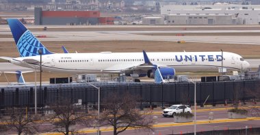 A United Airlines flight at O'Hare International Airport, Chicago, Illinois, Dec. 13, 2022. (AFP Photo)
