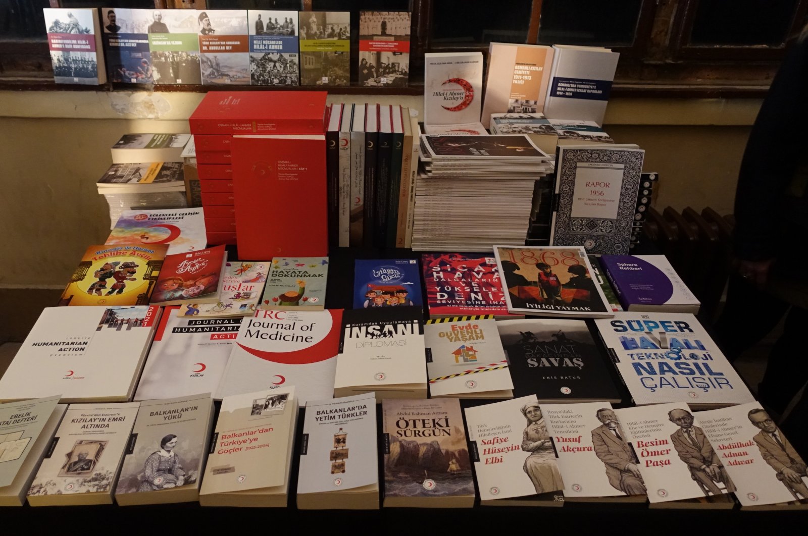 Some of the books published by Kızılay Culture &amp; Arts Publications displayed in the press meeting, Istanbul, Türkiye, Jan. 10, 2023. (AA Photo)