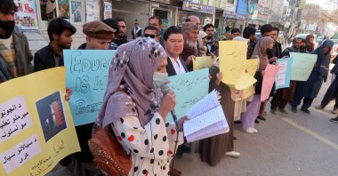 Afghan refugees in Pakistan hold placards during a protest as they demand the Taliban government to allow education for girls, in Quetta, the provincial capital of Balochistan province, Pakistan, Dec. 24, 2022. (EPA Photo)