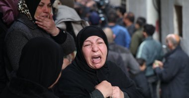 Palestinians mourn during the funeral of Samir Aslan, 41, at Qalandia refugee camp, occupied West Bank, Palestine, Jan. 12, 2023. (AFP Photo)
