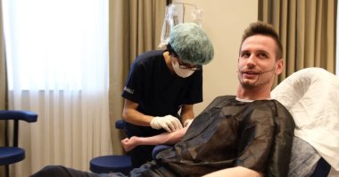 A patient receives a hair transplant in Istanbul, Türkiye, Dec. 15, 2022. (IHA Photo)